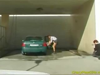 Crazy pee mistress at the car wash